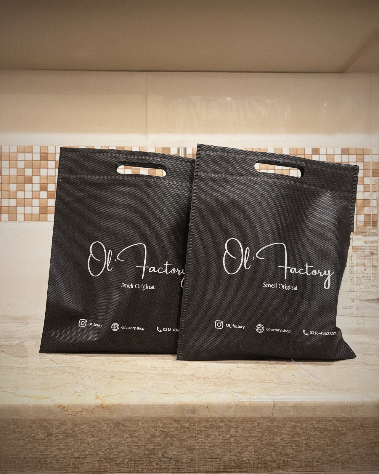 Ol' Factory branded black gift bags