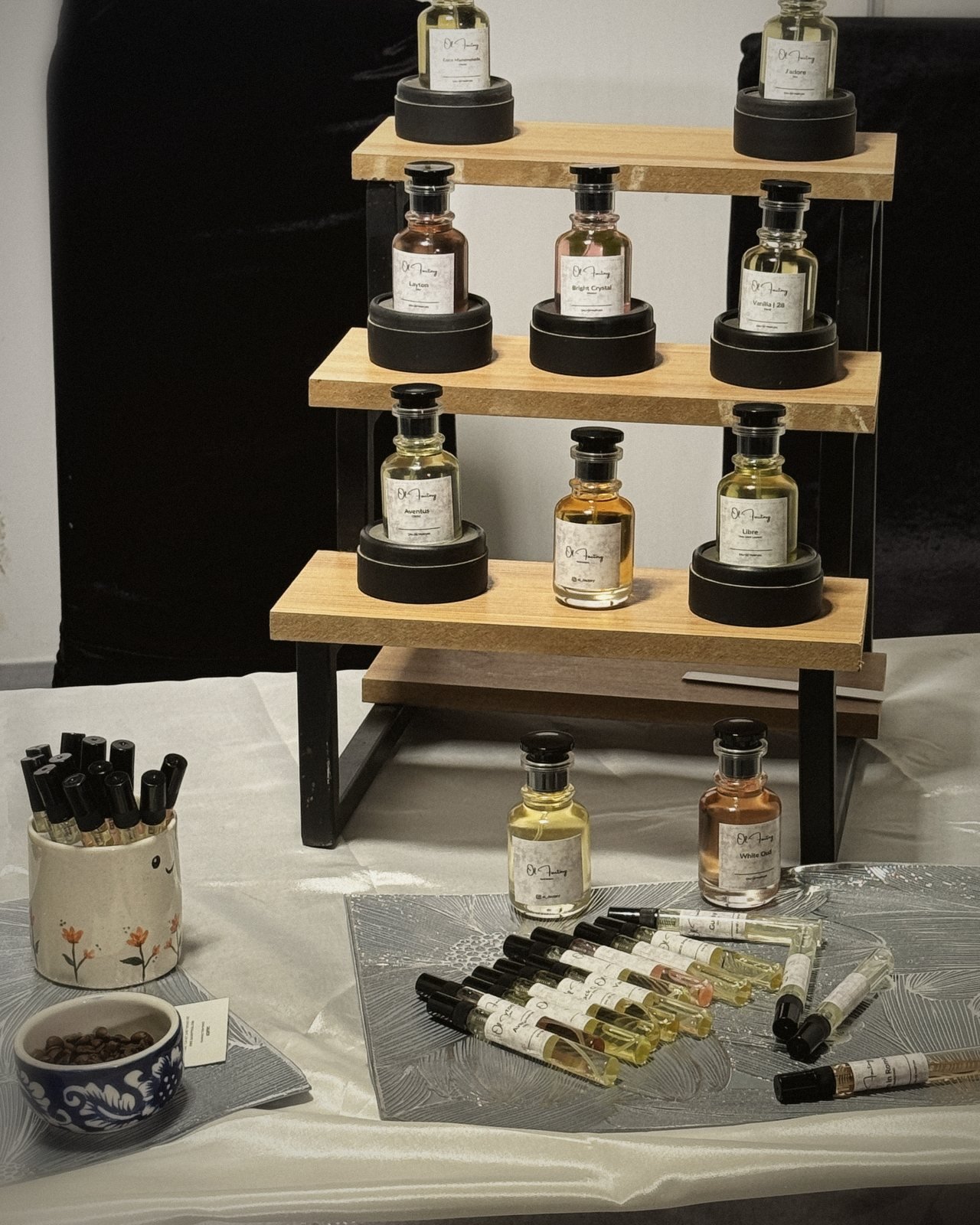 Perfume testers, paper testing strips and coffee beans at the Ol' Factory stall